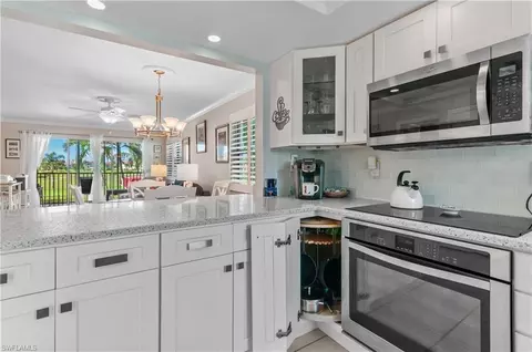 Kitchen - 37 High Point Cir E #210, Naples, FL 34103 photo 4 of 4