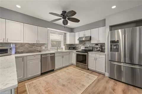 Kitchen - 809 101st Ave N, Naples, FL 34108 photo 1 of 2