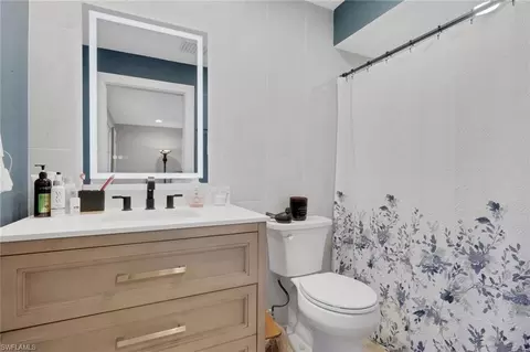 Bath - 687 Cypress Way E, Naples, FL 34110 photo 2 of 4