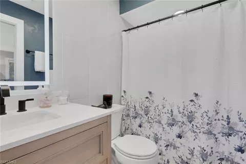 Bath - 687 Cypress Way E, Naples, FL 34110 photo 1 of 4