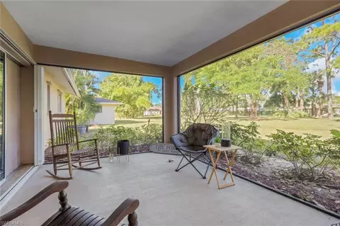 Exterior - 687 Cypress Way E, Naples, FL 34110 photo 6 of 7