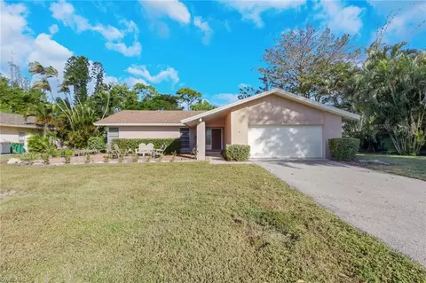Exterior - 687 Cypress Way E, Naples, FL 34110 photo 1 of 7