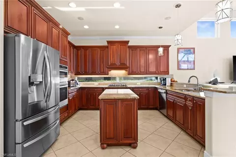 Kitchen - 8766 Largo Mar Dr, Fort Myers, FL 33967 photo 3 of 4