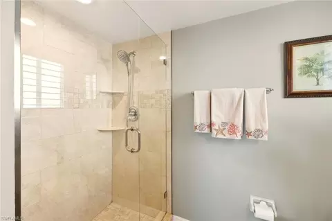 Bath - 7772 Emerald Cir #101, Naples, FL 34109 photo 2 of 3