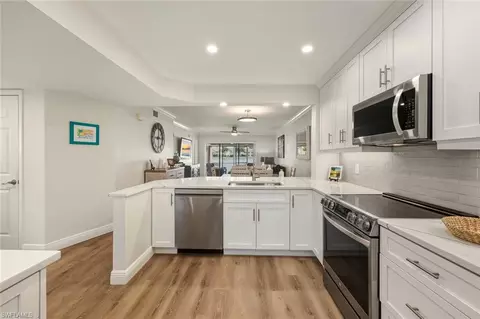 Kitchen - 7772 Emerald Cir #101, Naples, FL 34109 photo 3 of 4