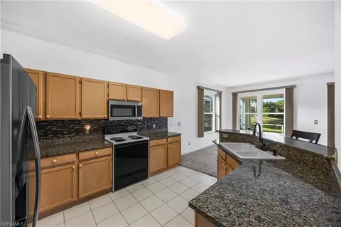 Kitchen - 223 Stanhope Cir, Naples, FL 34104 photo 3 of 4