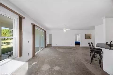 Living - 223 Stanhope Cir, Naples, FL 34104 photo 4 of 5