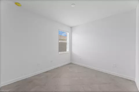 Bedroom - 1555 Double Eagle Trl, Naples, FL 34120 photo 6 of 7