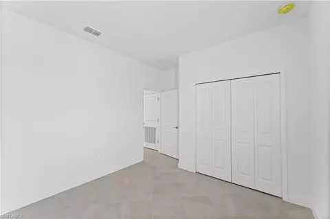 Bedroom - 1555 Double Eagle Trl, Naples, FL 34120 photo 7 of 7