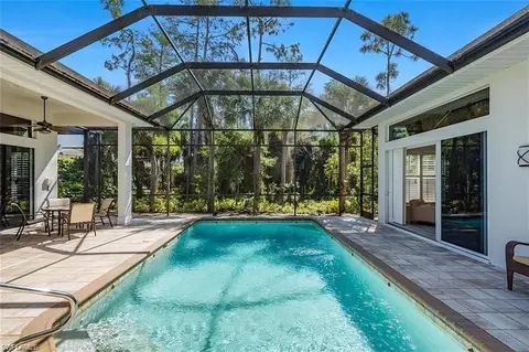 Exterior - 538 Eagle Creek Dr, Naples, FL 34113 photo 5 of 16