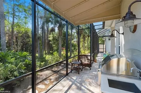 Exterior - 538 Eagle Creek Dr, Naples, FL 34113 photo 9 of 16