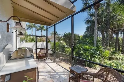 Exterior - 538 Eagle Creek Dr, Naples, FL 34113 photo 8 of 16