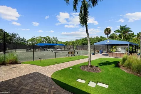 Exterior - 538 Eagle Creek Dr, Naples, FL 34113 photo 15 of 16