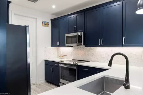 Kitchen - 7480 Rockefeller Dr, Naples, FL 34119 photo 2 of 3