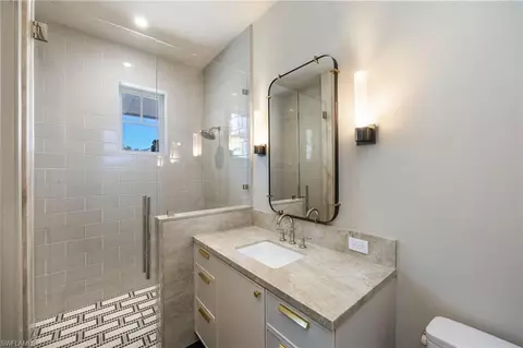 Bath - 4851 Crayton Rd, Naples, FL 34103 photo 7 of 11