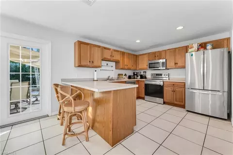 Kitchen - 2772 Riverview Dr, Naples, FL 34112 photo 2 of 2