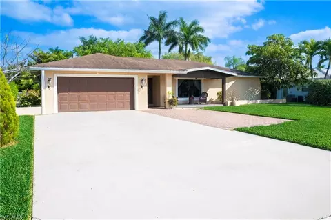 233 Baltusrol Dr, Naples, FL 34113