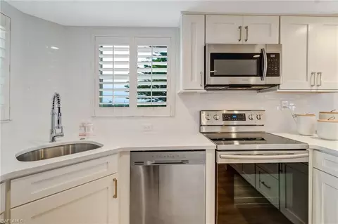 Kitchen - 21 High Point Cir E #601, Naples, FL 34103 photo 4 of 4
