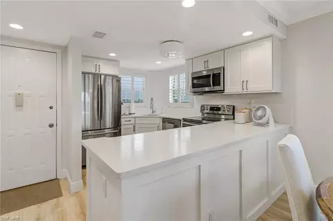 Kitchen - 21 High Point Cir E #601, Naples, FL 34103 photo 1 of 4