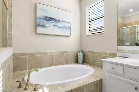 Bath - 4698 Abaca Cir, Naples, FL 34119 photo 2 of 4
