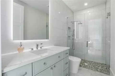 Bath - 13455 Pond Apple Dr E, Naples, FL 34119 photo 7 of 8