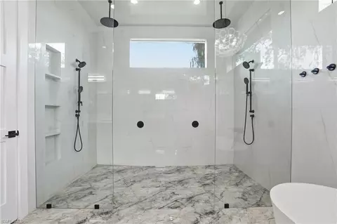 Bath - 13455 Pond Apple Dr E, Naples, FL 34119 photo 4 of 8