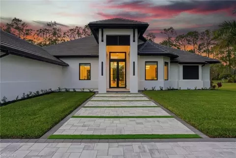 Exterior - 13455 Pond Apple Dr E, Naples, FL 34119 photo 1 of 9