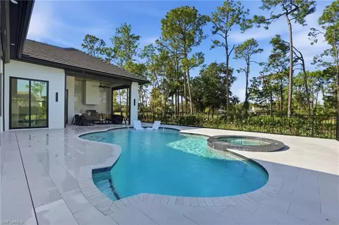 Exterior - 13455 Pond Apple Dr E, Naples, FL 34119 photo 8 of 9
