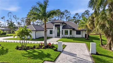 Exterior - 13455 Pond Apple Dr E, Naples, FL 34119 photo 3 of 9