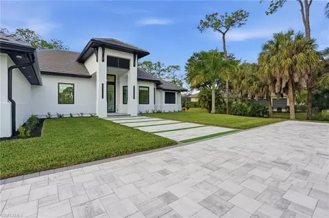 Exterior - 13455 Pond Apple Dr E, Naples, FL 34119 photo 4 of 9