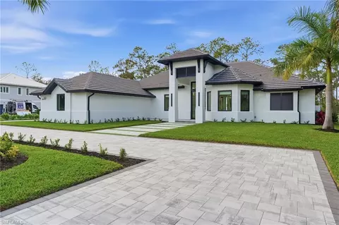 Exterior - 13455 Pond Apple Dr E, Naples, FL 34119 photo 2 of 9