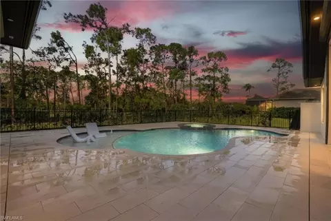 Exterior - 13455 Pond Apple Dr E, Naples, FL 34119 photo 7 of 9