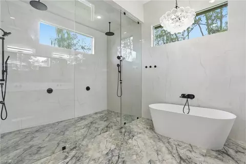 Bath - 13455 Pond Apple Dr E, Naples, FL 34119 photo 3 of 8
