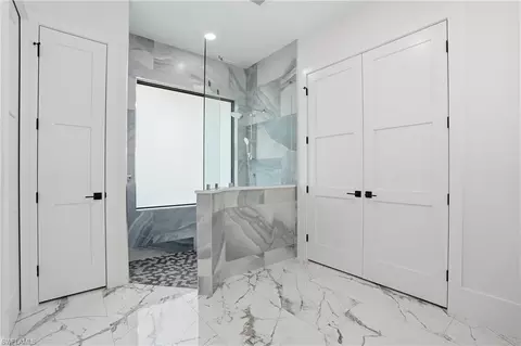 Bath - 13455 Pond Apple Dr E, Naples, FL 34119 photo 1 of 8