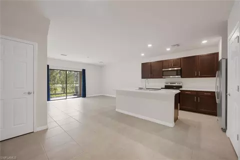 15071 Wildflower Cir, Naples, FL 34119
