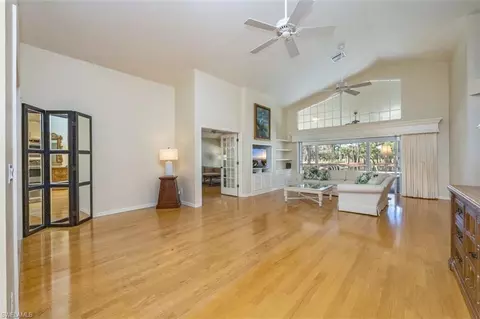 Living - 25 Grey Wing Pt, Naples, FL 34113 photo 2 of 2