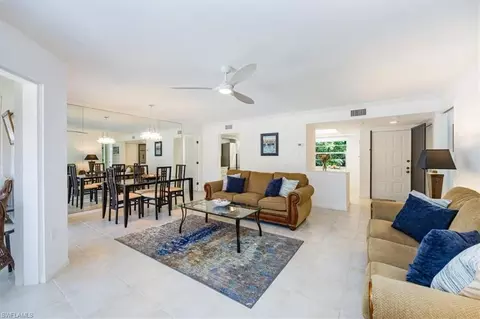 Living - 3200 Binnacle Dr #C4, Naples, FL 34103 photo 2 of 4