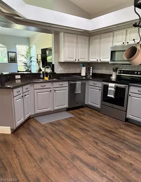 Kitchen - 22932 Forest Ridge Dr, Estero, FL 33928 photo 1 of 2