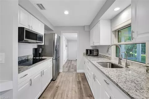 Kitchen - 54 Hilo Ct #54, Naples, FL 34112 photo 2 of 2