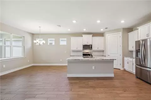 Living - 17899 Shade Tree Loop, Punta Gorda, FL 33982 photo 2 of 5