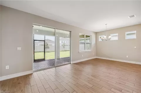 Living - 17899 Shade Tree Loop, Punta Gorda, FL 33982 photo 3 of 5