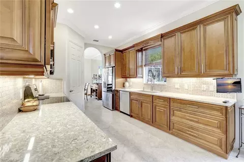 Kitchen - 6151 Ashwood Ln, Naples, FL 34110 photo 2 of 3