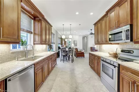 Kitchen - 6151 Ashwood Ln, Naples, FL 34110 photo 1 of 3