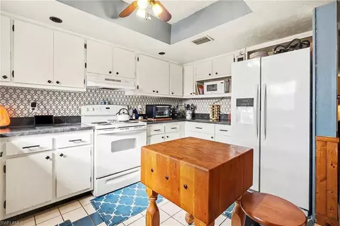Kitchen - 180 Cypress Way E #A103, Naples, FL 34110 photo 2 of 6