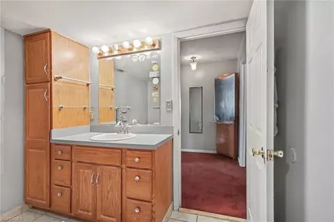 Bath - 180 Cypress Way E #A103, Naples, FL 34110 photo 3 of 3