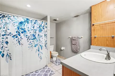 Bath - 180 Cypress Way E #A103, Naples, FL 34110 photo 2 of 3