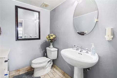 Bath - 180 Cypress Way E #A103, Naples, FL 34110 photo 1 of 3