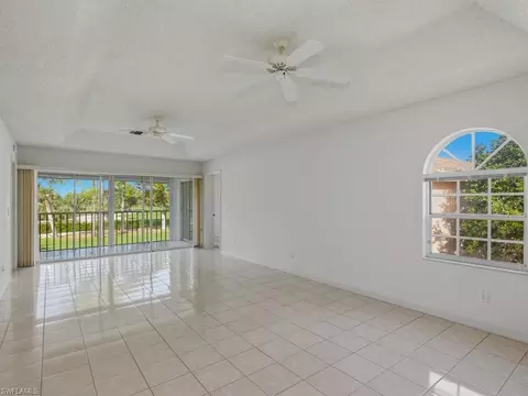 Living - 565 Augusta Blvd #10, Naples, FL 34113 photo 2 of 2