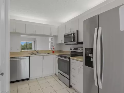 Kitchen - 565 Augusta Blvd #10, Naples, FL 34113 photo 1 of 2