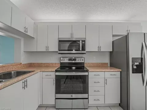 Kitchen - 565 Augusta Blvd #10, Naples, FL 34113 photo 2 of 2